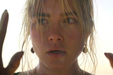 Alice looks paranoid with hair mussed and a flushed face.