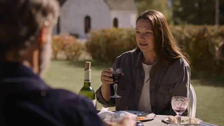 Tess at a garden party with Frank