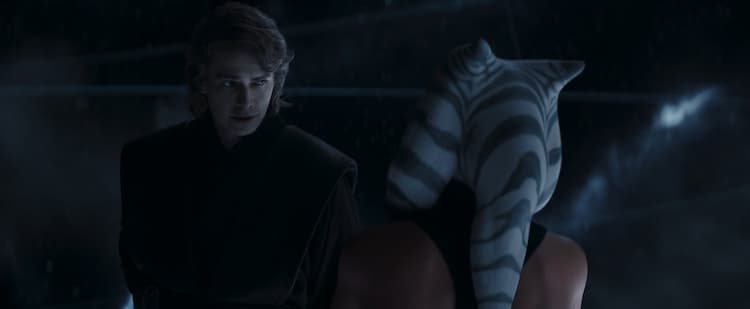 Anakin walks past Ahsoka with his hands behind his back