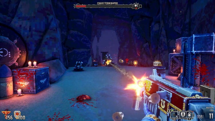 A Chaos Terminator is fired upon by the Space Marine in a darkened cave. He is stunlocked by the player’s constant Bolter fire.